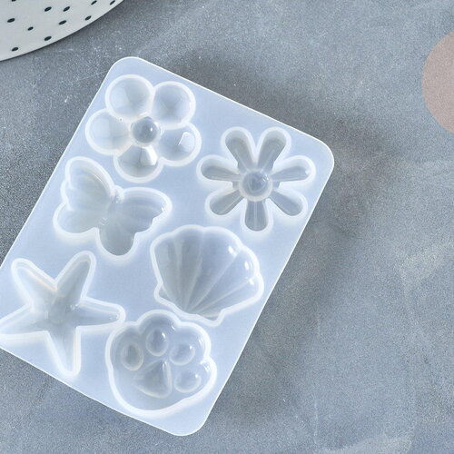 Moule pour fabrication bijoux formes fleurs coquillages résine 67x50x6mm, x1 g7996
