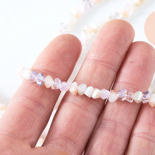 Perle triangle cristal beige rose 6x3.5mm, fil de 33cm, x1 (g6903)