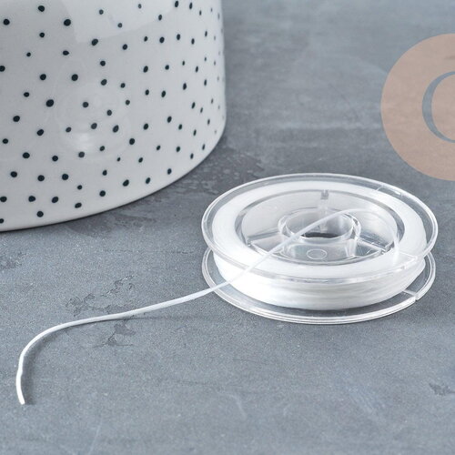 Bobine de 10 mètres de fil élastique nylon blanc 0.8mm,création bijoux, x1 (g8914)