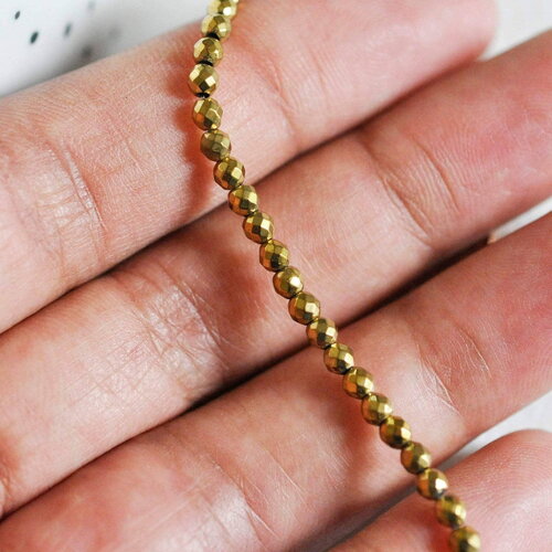 Perles ronde facettée hématite synthétique dorée 3mm, fil de 40cm x1 (g3683)