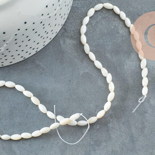 Perles grain de riz nacre blanche 8mm, x1 fil de 38cm (g0770)