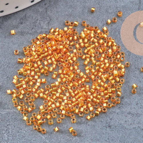 Perles rocaille tube verre orange transparent silver line, x1 sachet de 8g (g10923)