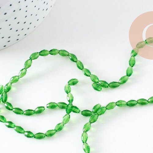 Perle ovale verre facetté vert clair 6x4mm, fil de 38cm, x1 (g10600)