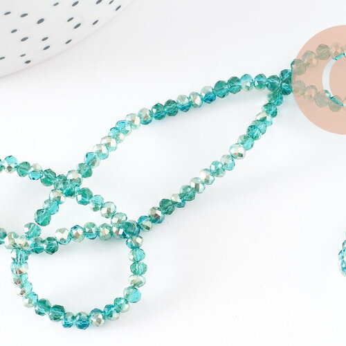 Perles toupies cristal bleu turquoise transparent irisé 3.5x2.5mm, x1 fil de 40cm (g6760)