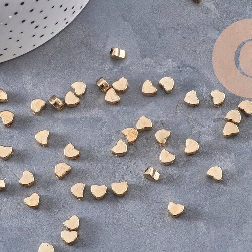 Perles coeur plastique doré 5.5mm, x 10g (g10969)