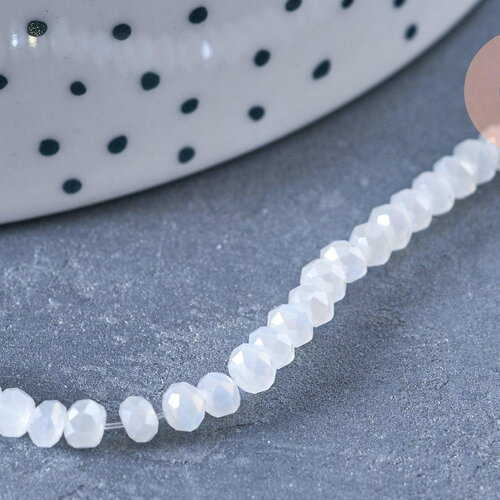 Perles toupies cristal blanc irisé 3.5x2.5mm, fil 25.4cm x1 (g6763)