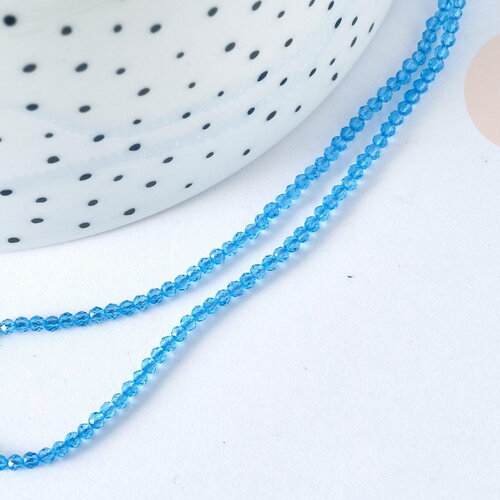 Perle ronde verre facettée transparente bleu ciel 2mm, diy, le fil de 37cm (g7338)