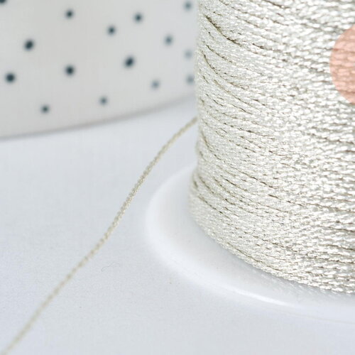Fil nylon effet métallisé argent , fabrication bijoux,création bijoux,ruban mariage,largeur 1mm,longueur 1 m, g6813