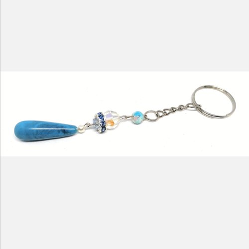 Porte clé perle, strass et breloque bleu