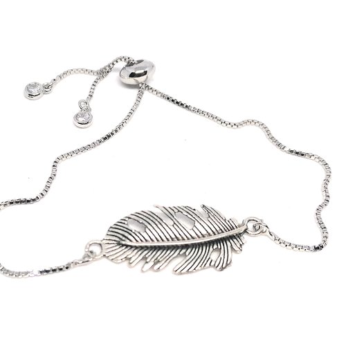 Bracelet argenté plume- attache coulissante et strass - collection gold phénix