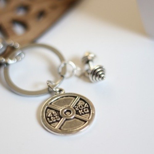 Porte clés pour lui breloque haltères métal argenté