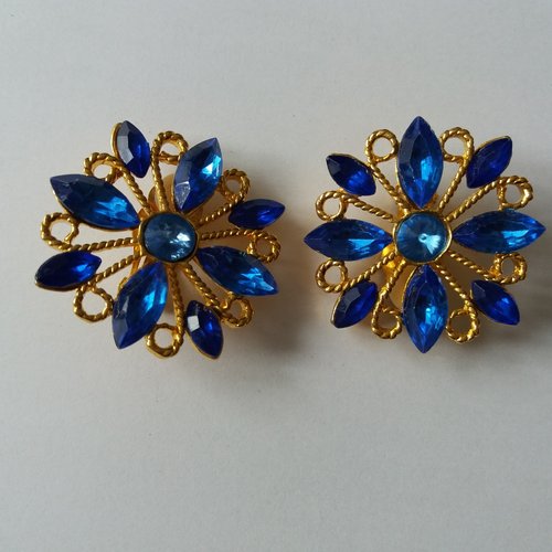 Broche fantaisie fleur, à clips,  métal doré et perles navettes à facettes bleues