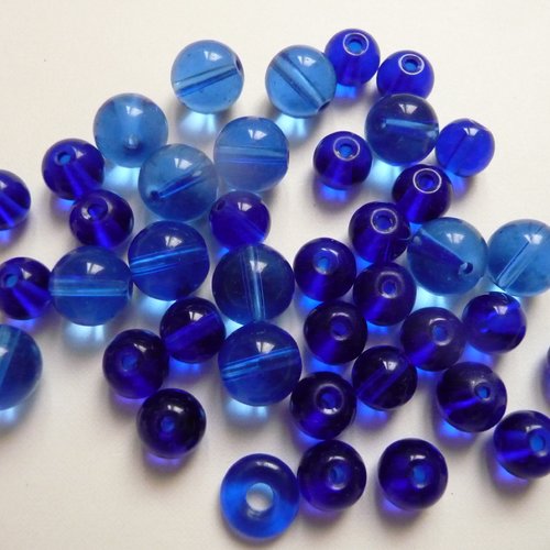 Perles bleues - assortiment de 38 perles rondes en verre couleur bleue
