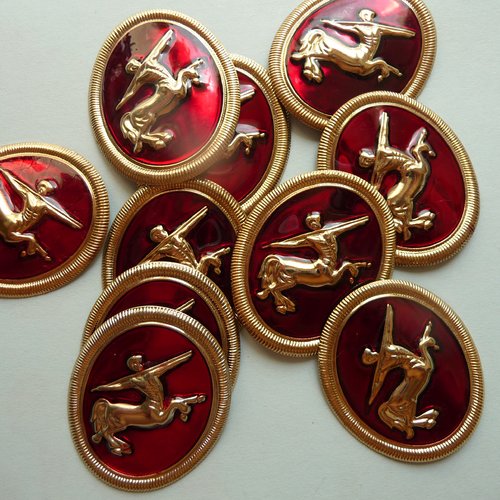 10 medaillons ovales, metal dore avec fond rouge motif zodiaque sagittaire centaure