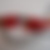 Bijou de sac en verre cristal rouge avec facettes