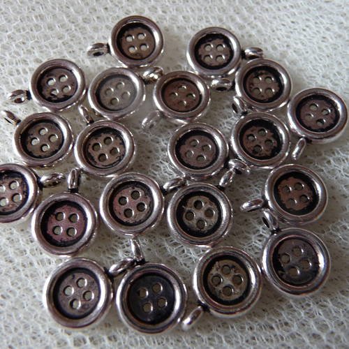 10 petites breloques forme "bouton rond" en metal argente vieilli 