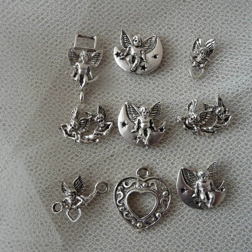 Breloques anges en metal argente 