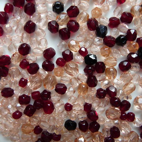 300 perles  a facettes en verre de boheme, couleurs rose et grenat 