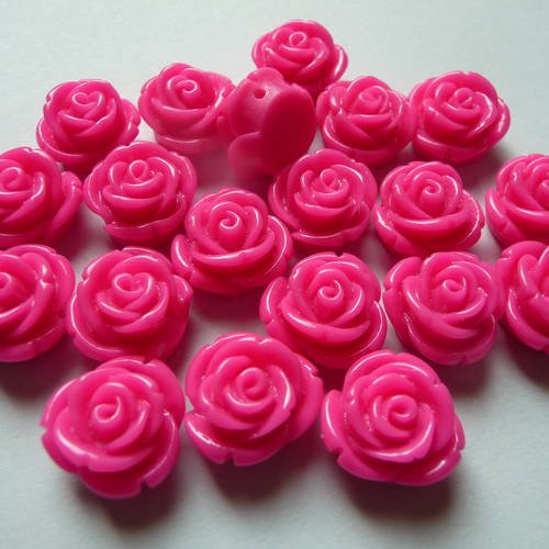 10 cabochons fleurs  roses en resine couleur rose bonbon 