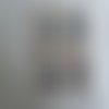 4 petits cadres blancs en plastique imitation bois
