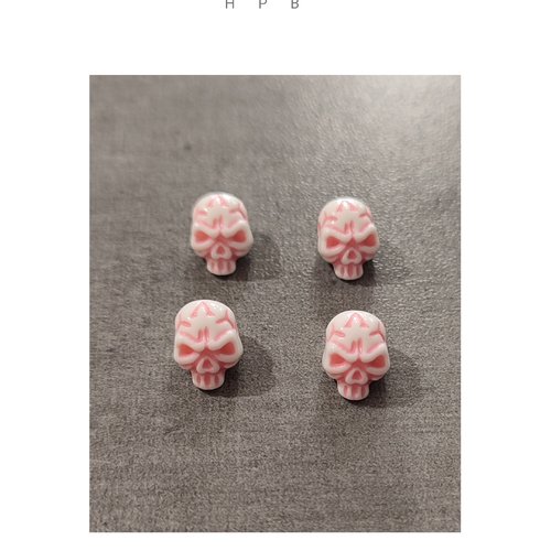 Lot de 4 perles acryliques en forme de crâne