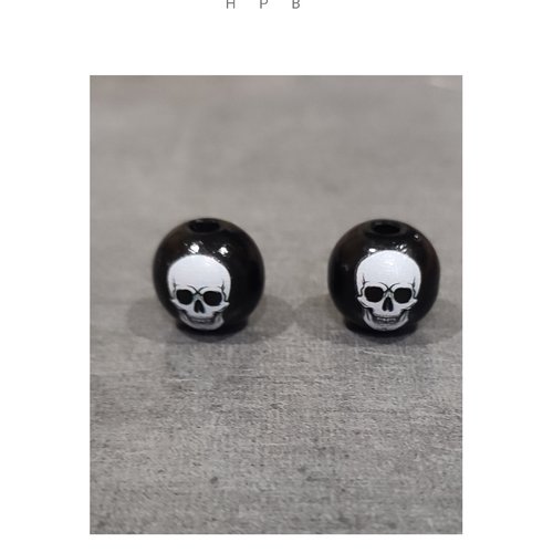 Lot de 2 perles en bois tête de mort