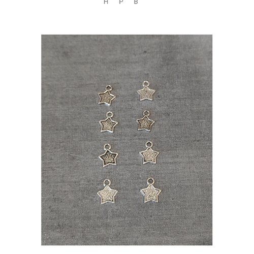 Lot de 8 petites breloques étoiles en métal argenté