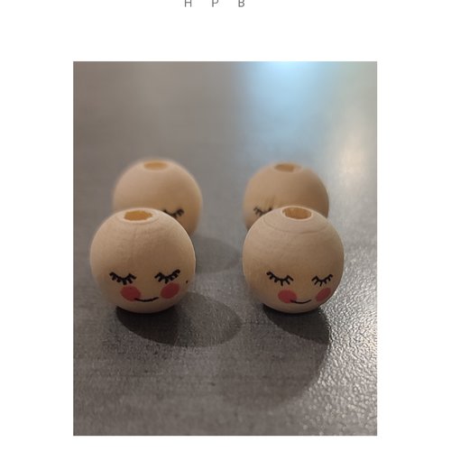 Lot de 4 perles rondes décorées 16  mm en bois