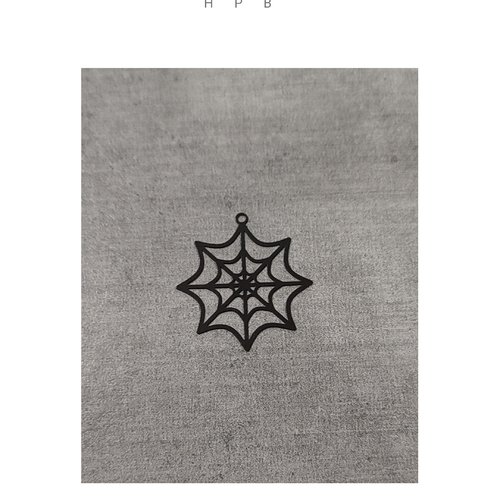 Estampe toile d'araignée en laiton