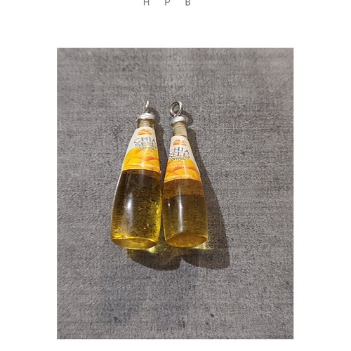 Lot de 2 breloques résine bouteille