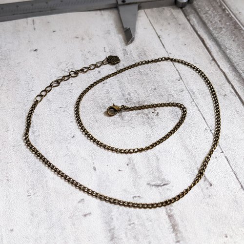 Chaine métal bronze à maillons twist serrés 1x2mm fermoir mousqueton extension 40-45cm x1