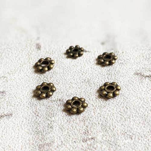 Perles intercalaires fleurs métal bronze 4mm x10