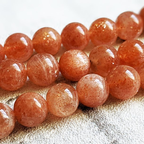 Perles en véritable pierre de soleil héliolite inclusions d'hématites grade aa+ 7 mm x5