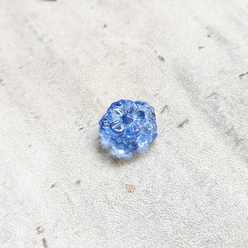 Perle verre fleur relief 15 mm bleu transparent x1