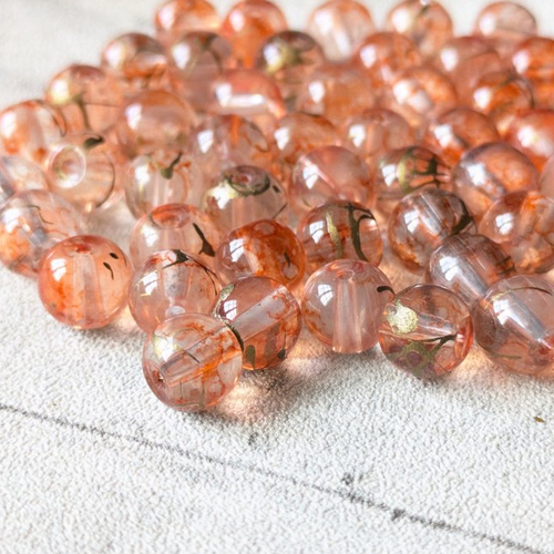 Perles rondes orange translucide peinte tréfilé doré 8 mm x10