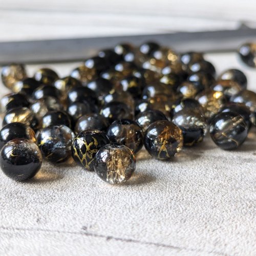 Perles rondes effet craquelé noir translucide tréfilé doré 8 mm x10