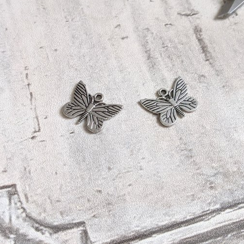 Breloques papillons métal argenté 15x22mm x2