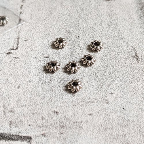Perles toupies fleurs métal argenté 5x2mm x10