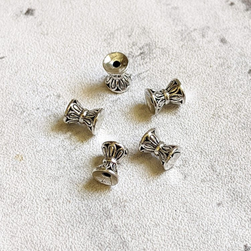 Perles métal argent forme sablier style ethnique 17x6mm x5