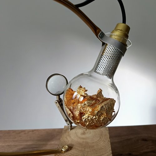 La lampe et la loupe