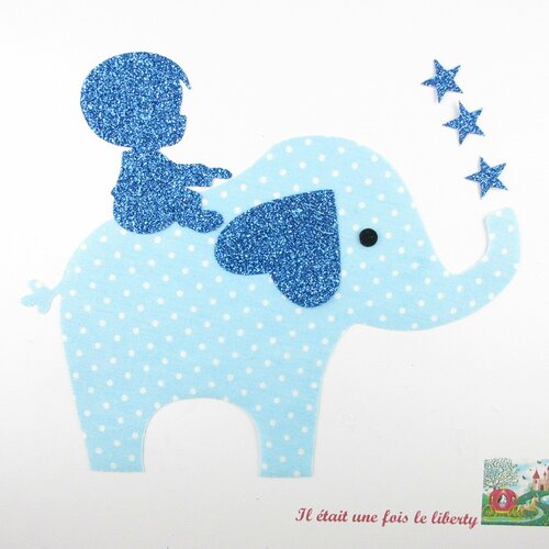 Appliqués thermocollants petit garçon sur le dos d'un éléphant en tissu à pois bleu ciel flex pailleté patch à repasser applique écusson