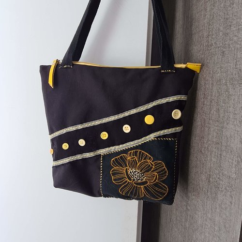 Sac jaune et noir