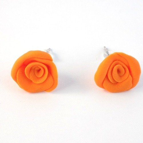 Puces d'oreilles roses en polymère orange