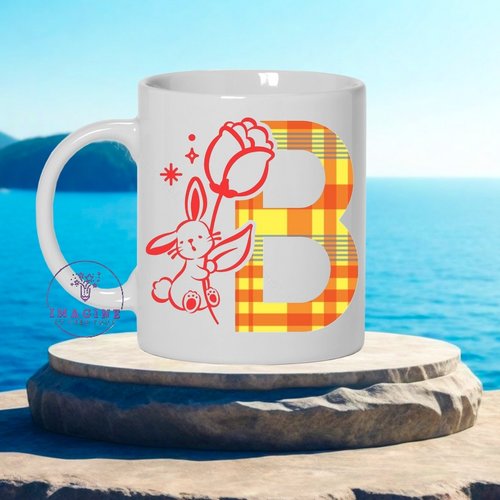 Mug lapin initiale - pâques - chocolat - œuf - fête - coeurs - cadeau à offrir -thème madras (initiale à préciser)