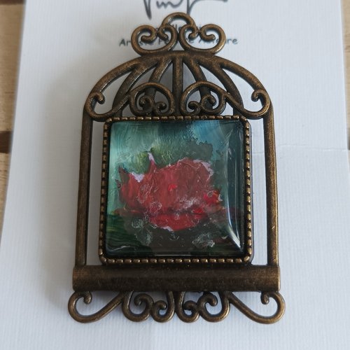 Verre peint,effets craquelures pour cette broche et sa fleur rouge dans une cage oiseau,cabochon carré, pluie ciel bleu gris