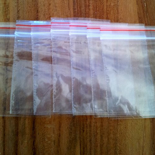 50 petits sachets transparents pour confiseries avec attaches