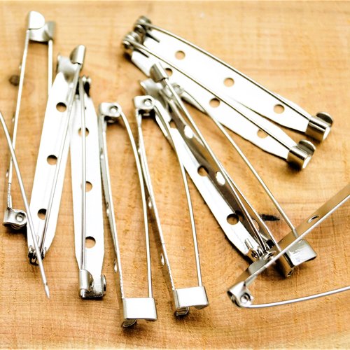 Support broches 3 trous 35 à 45 mm rhodium par 10