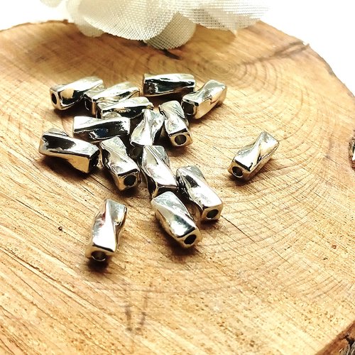 Lot de 20 perles tubes torsadés argentés 8mm