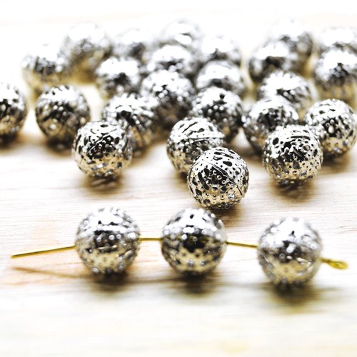Perles métal argenté mat en filigrane évidé 6 à 10 mm par 25
