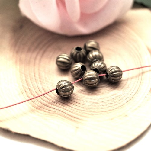 Perles citrouille bronze antique 6mm par lot de 25